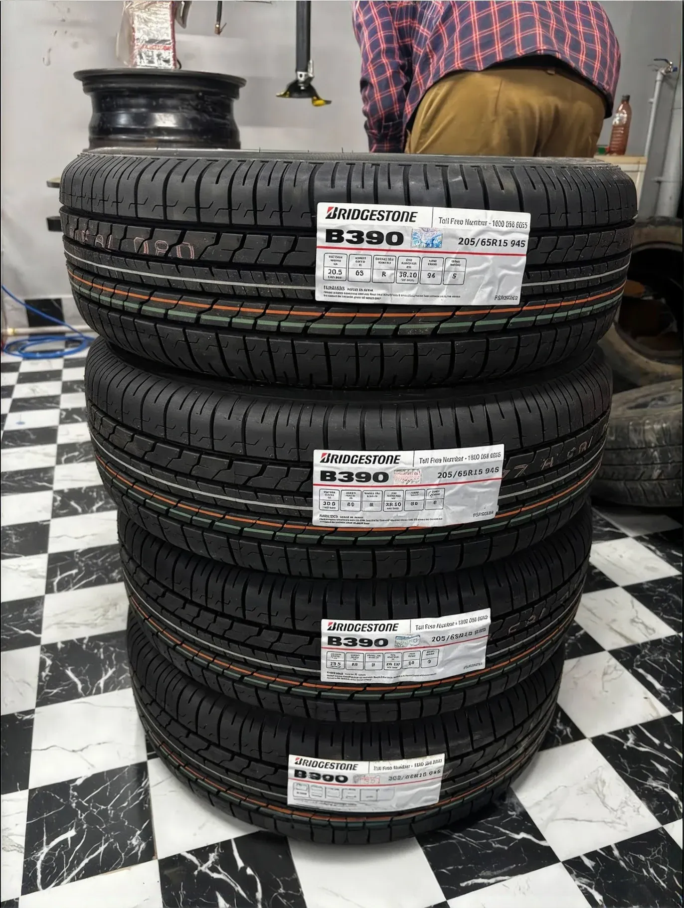 Stacked Bridgestone B390 tyres ready for sale
